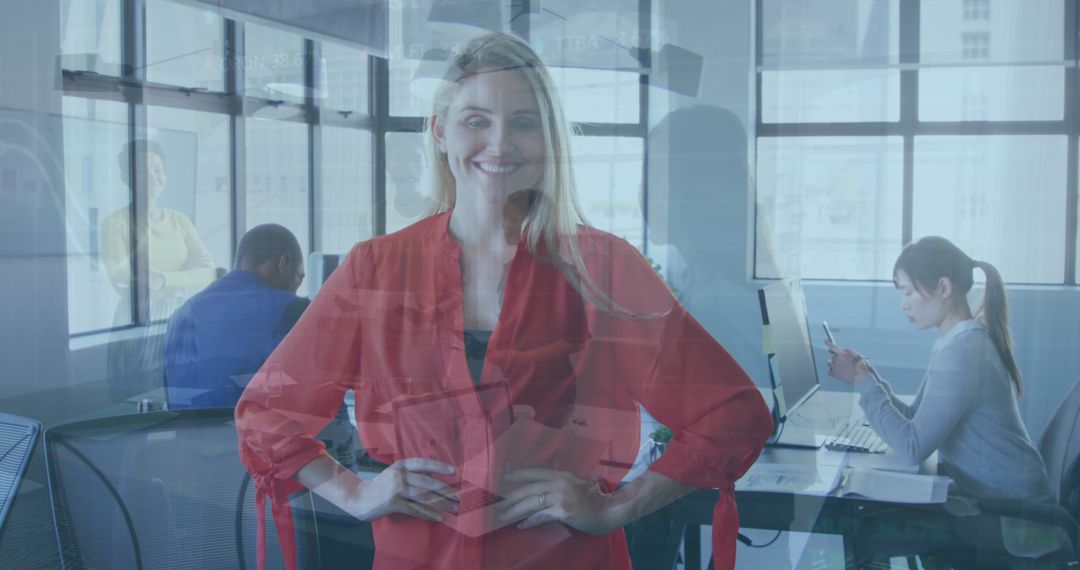 Smiling Businesswoman in Modern Office with Colleagues Working in Background - Free Images, Stock Photos and Pictures on Pikwizard.com