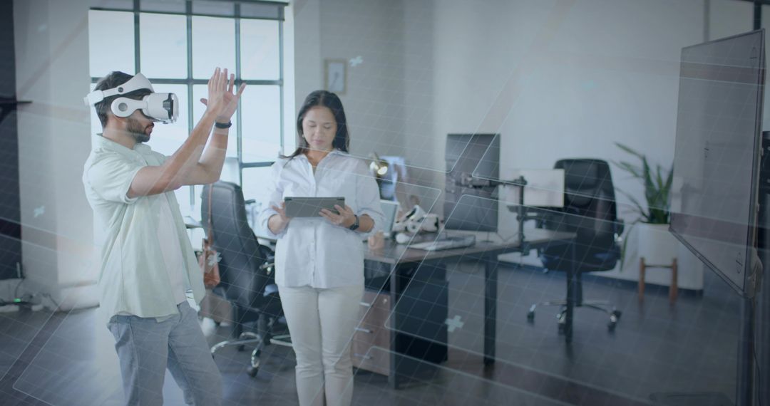 Professionals Engaging with Virtual Reality Technology in Modern Office