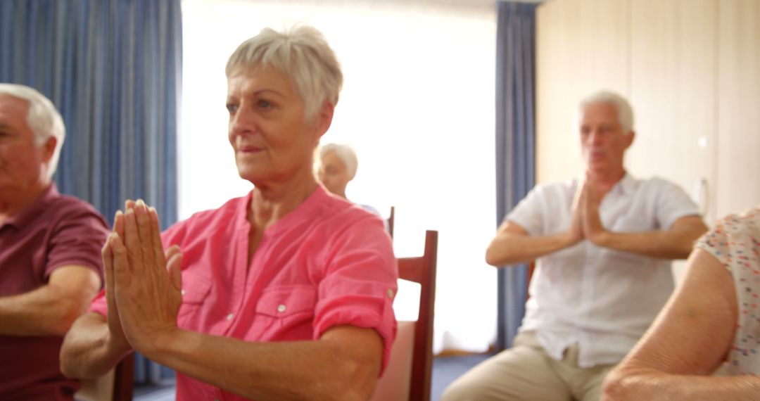 Seniors Practicing Seated Meditation in Group Class - Free Images, Stock Photos and Pictures on Pikwizard.com