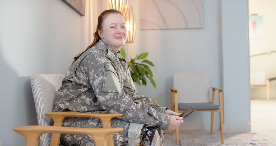 Soldier with Prosthetic Learns New Skills in Waiting Area