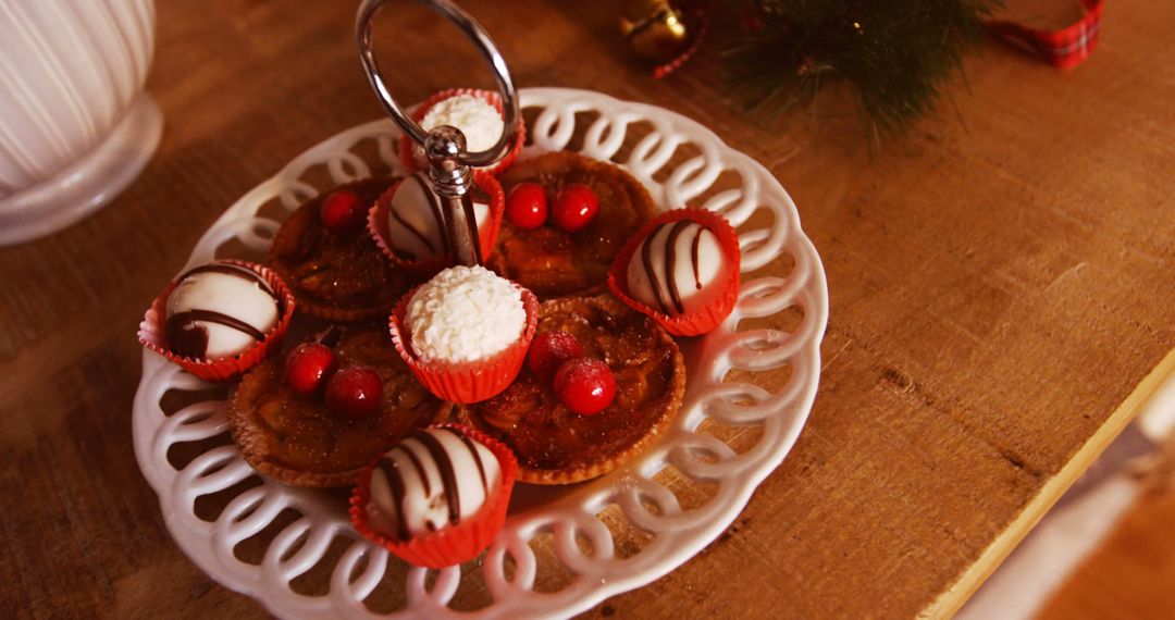 Holiday Dessert Display with Festive Sweets on Ceramic Plate - Free Images, Stock Photos and Pictures on Pikwizard.com