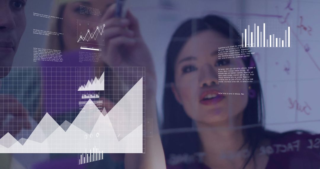 Business Professionals Analyzing Data and Charts in Office
