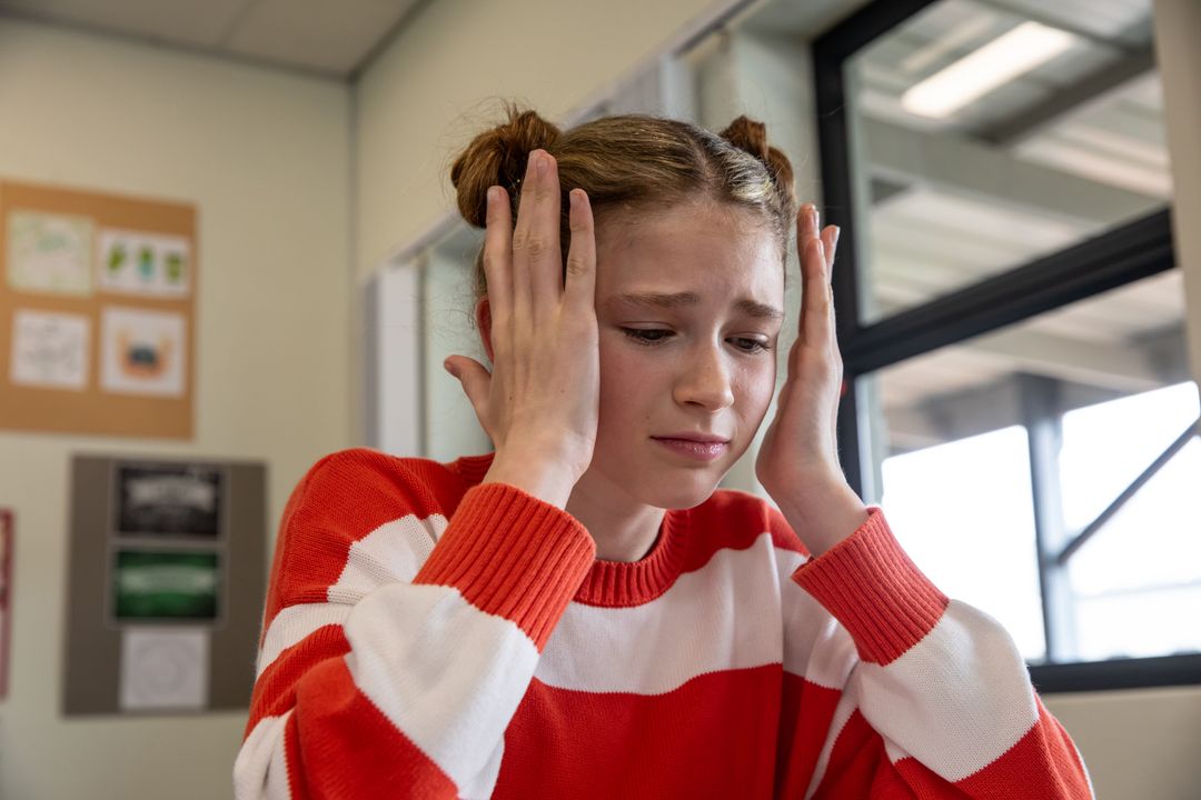 Stressed Student in Classroom Facing Concentration Challenges