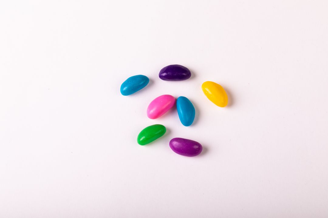 Colorful Candies on White Background - Free Images, Stock Photos and Pictures on Pikwizard.com