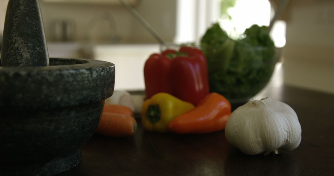 Fresh Vegetables and Mortar in a Modern Kitchen - Free Images, Stock Photos and Pictures on Pikwizard.com