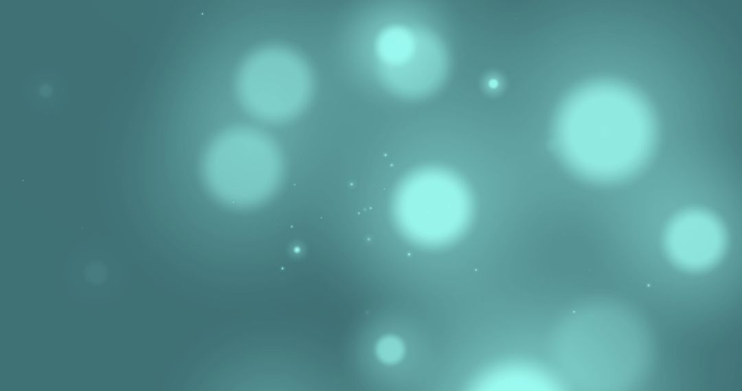 Glowing Green Abstract Light Spots on Blurred Background