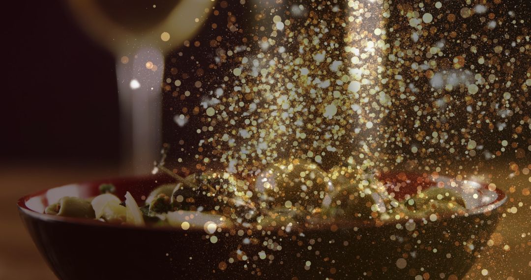 Festive Golden Bokeh over Wine Glass and Appetizers