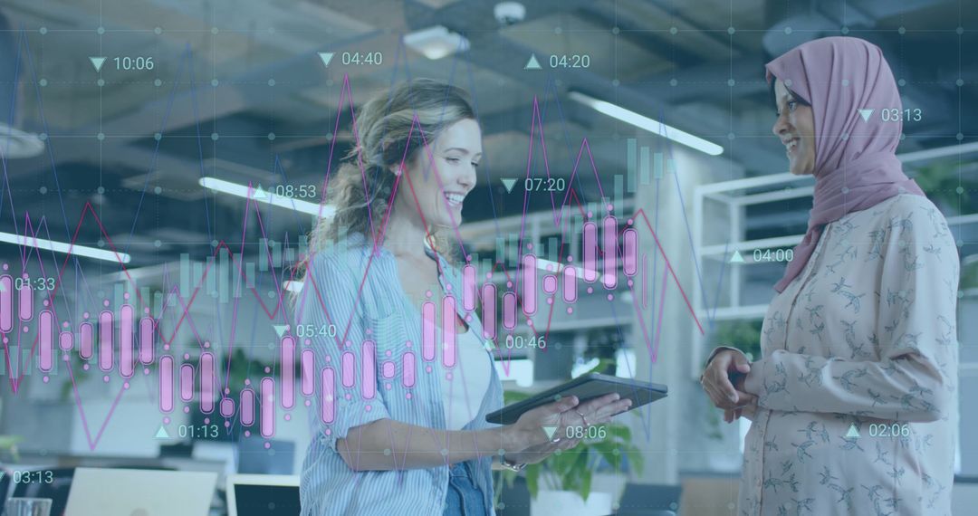 Diverse Colleagues Discussing Digital Data in Modern Office