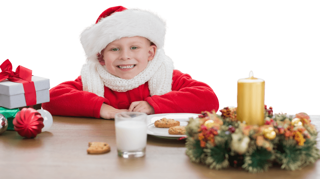 Smiling Boy with Santa Hat and Christmas Treats on Transparent