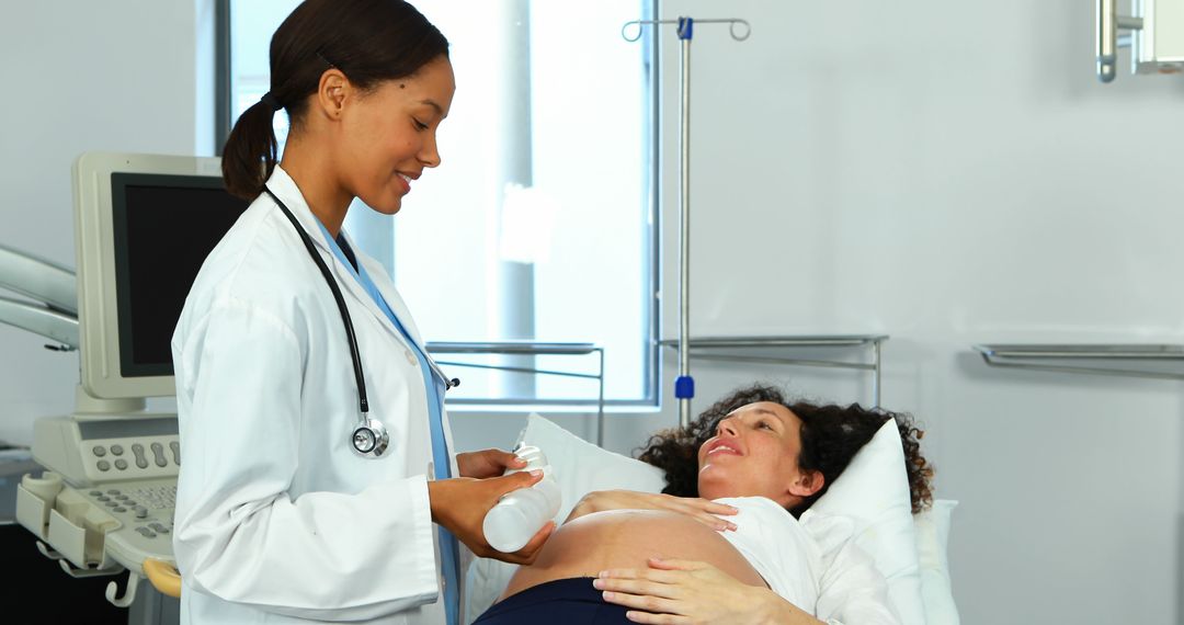 Medical Professional Conducting Ultrasound on Pregnant Woman - Free Images, Stock Photos and Pictures on Pikwizard.com