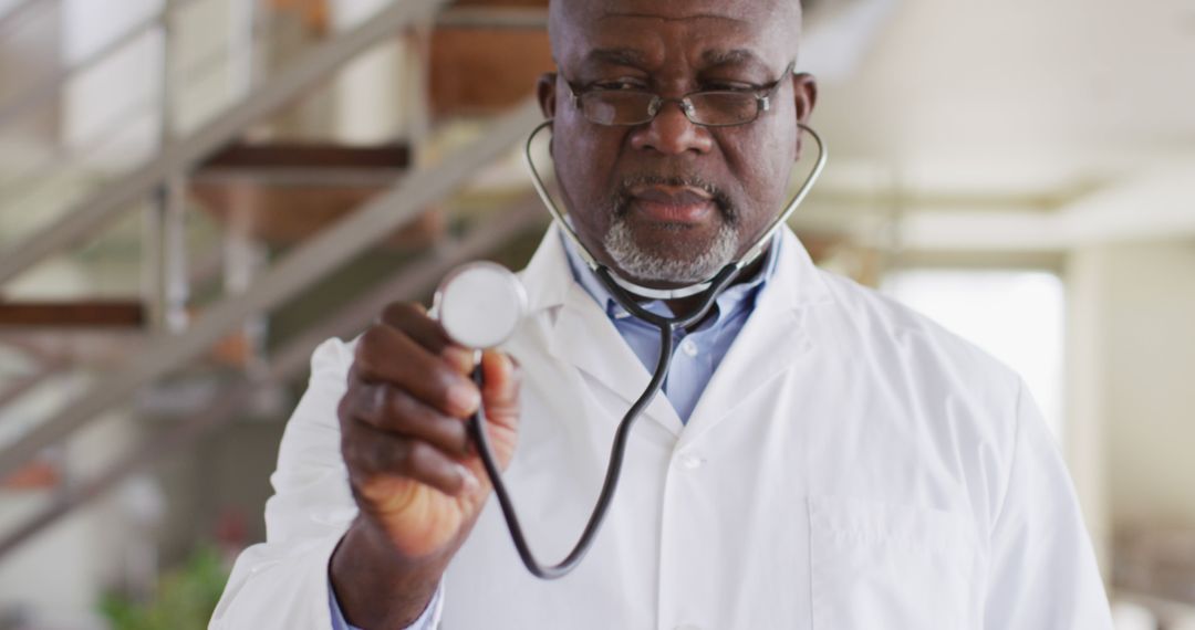 Doctor Holding Stethoscope for Checking Patient Health - Free Images, Stock Photos and Pictures on Pikwizard.com