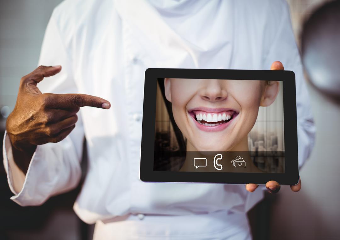 Chef Holding Tablet with Video Call Screen - Free Images, Stock Photos and Pictures on Pikwizard.com