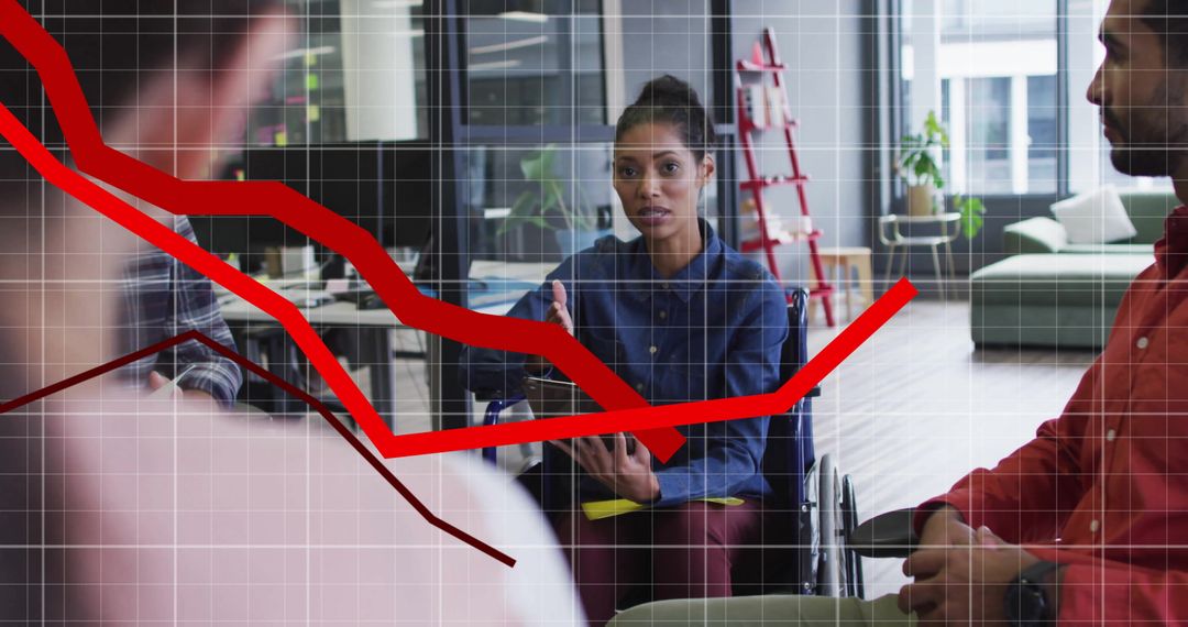 Diverse Team Analyzing Financial Trends in Office Meeting