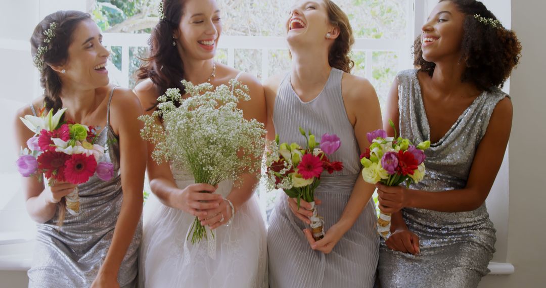 Joyful Bride with Bridesmaids Holding Colorful Bouquets - Free Images, Stock Photos and Pictures on Pikwizard.com