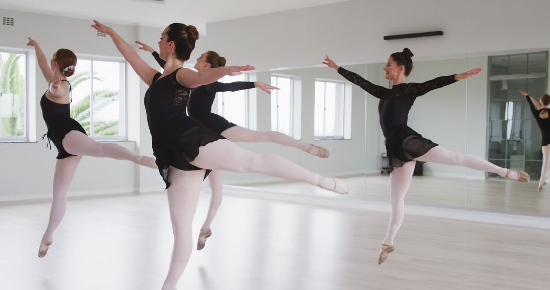 Ballet Dancers Practicing Techniques in Studio - Free Images, Stock Photos and Pictures on Pikwizard.com