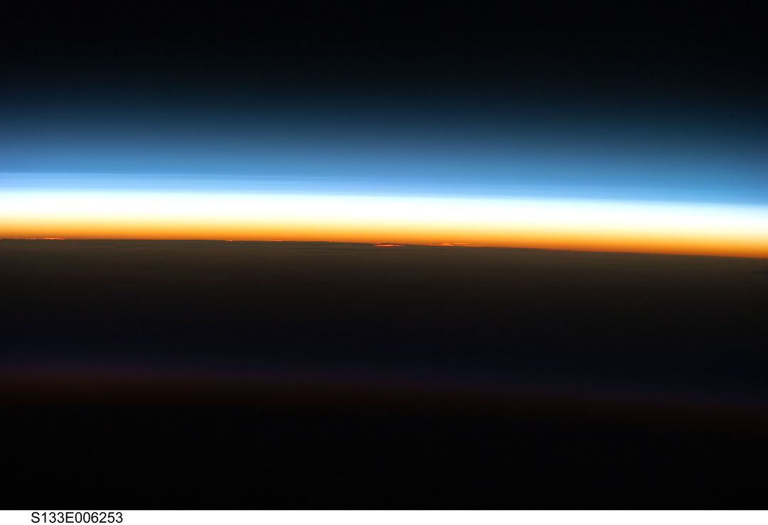 Stunning Sunrise from Space, Layers of Earth's Atmosphere - Free Images, Stock Photos and Pictures on Pikwizard.com