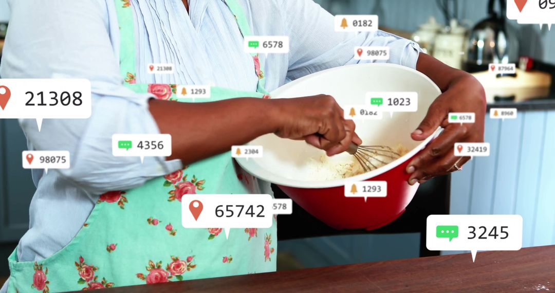 Senior Woman Whisking Batter with Digital Notifications Around