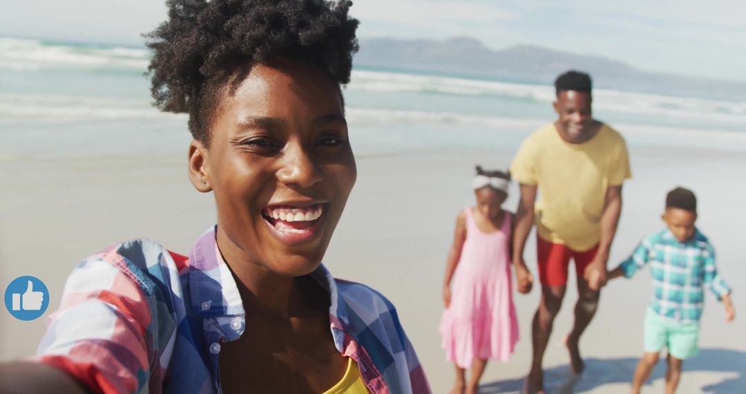 Smiling Family Selfie on Beachside Adventure