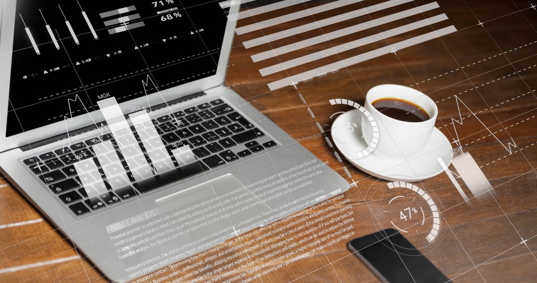 Data Analysis on Laptop with Coffee and Phone on Desk