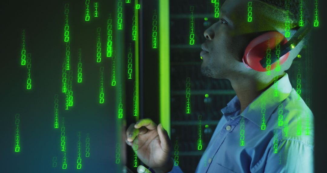 IT Engineer Wearing Headphones with Binary Code Overlay