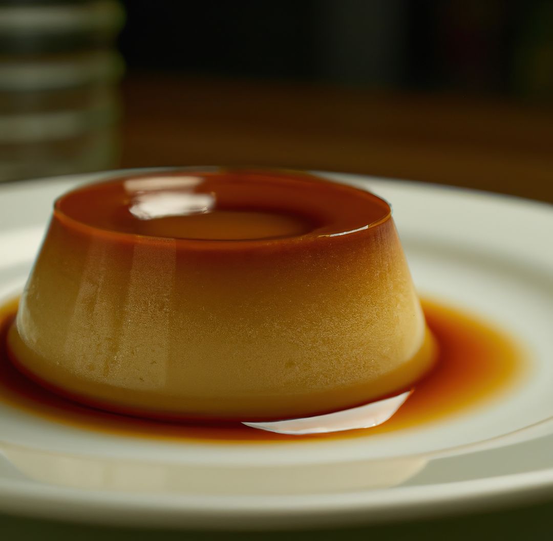 Close up of flan on white plate created using generative ai technology - Free Images, Stock Photos and Pictures on Pikwizard.com