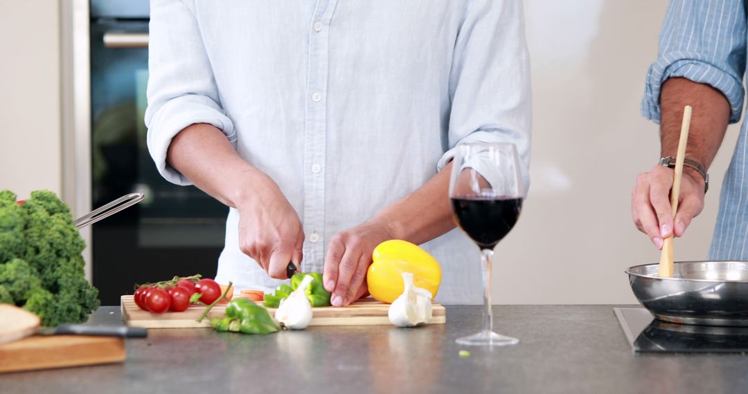 Couple Cooking and Bonding in Modern Kitchen