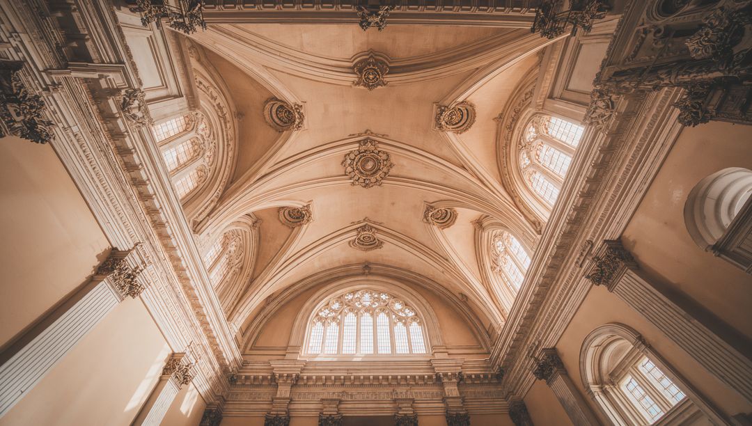 Showcasing baroque vaulted ceiling featuring ribbed vaults, rosettes and traceried clerestory window