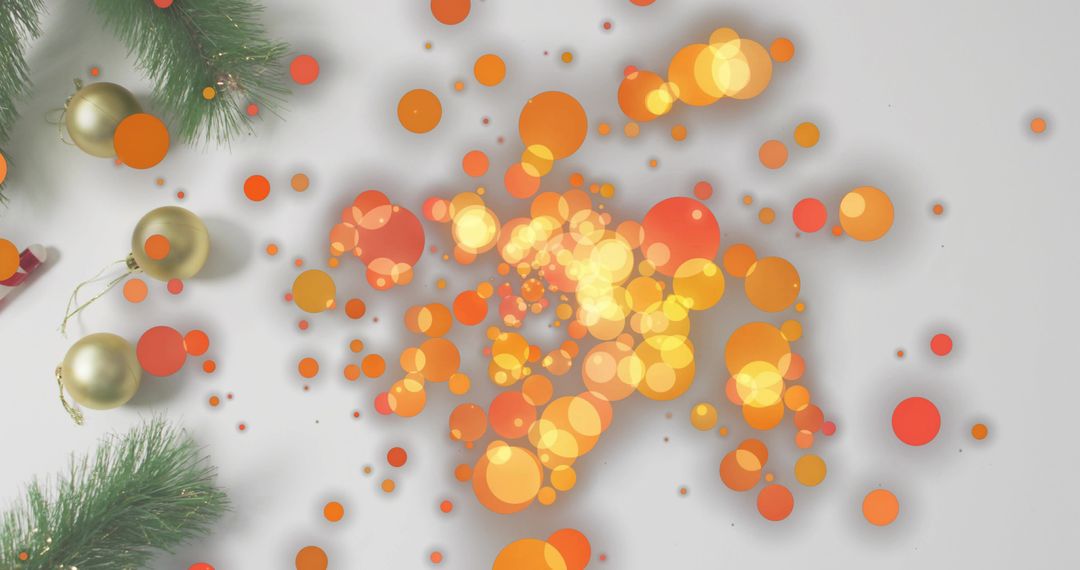 Glowing Orange Gold Bokeh with Pine Sprigs and Gold Baubles for Festive Holiday Design