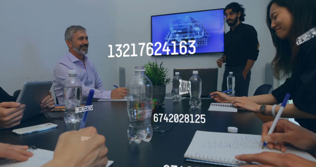 Diverse Team Collaborating with Data Projections in Modern Office