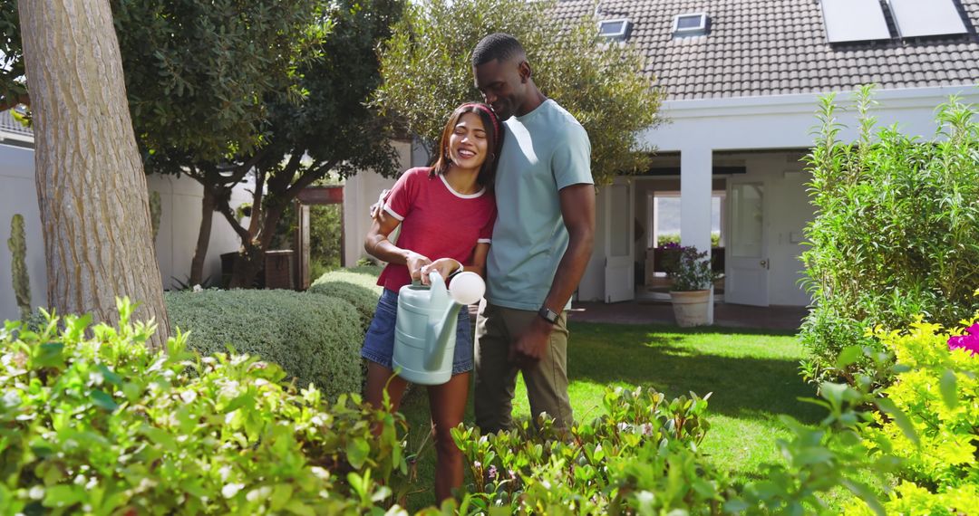 Couple Enjoying Gardening in Sunny Front Yard Garden