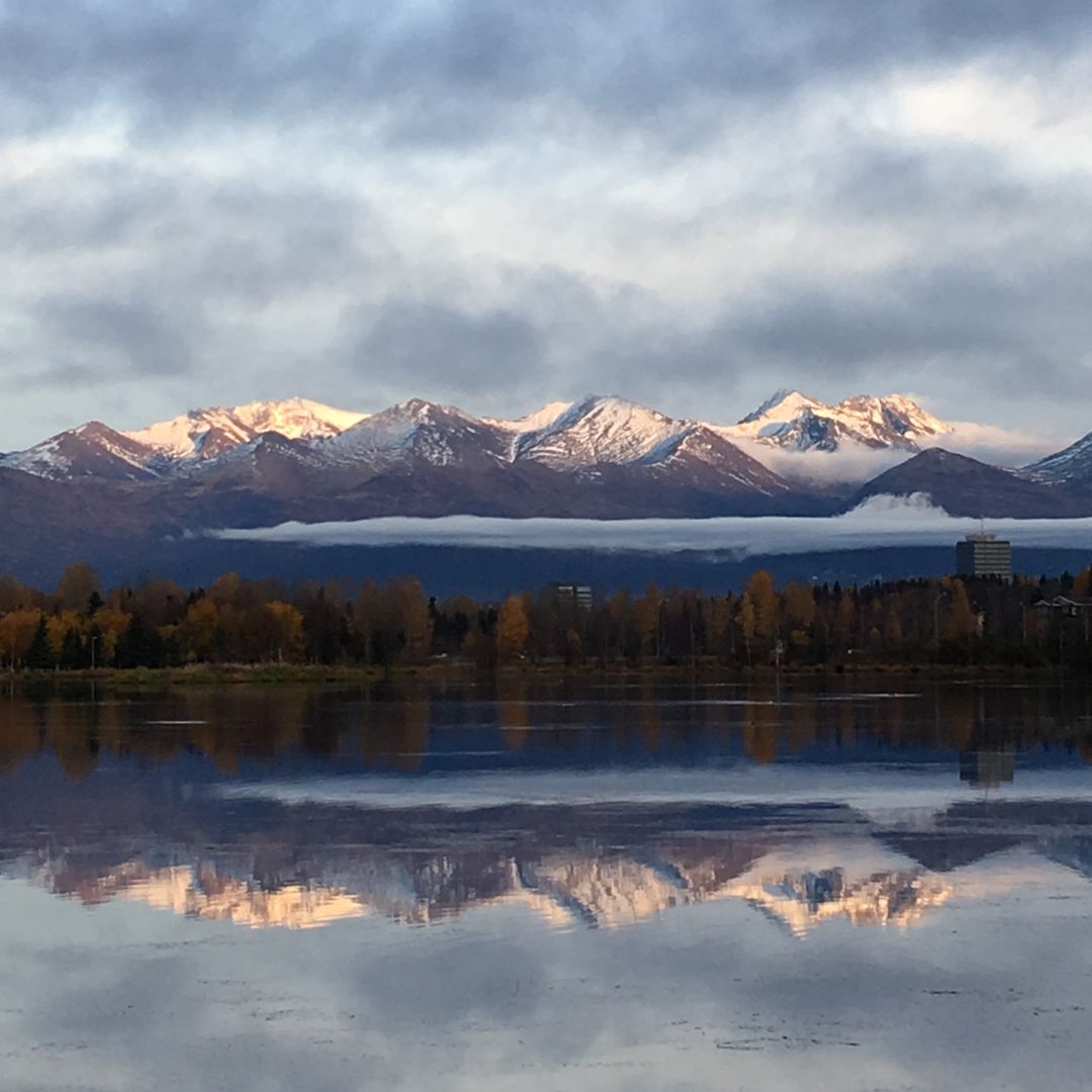 Serene Landscape of Snow-Capped Mountains and Lake Reflection - Free Images, Stock Photos and Pictures on Pikwizard.com