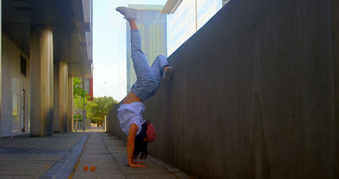 Woman Practicing Handstand in Urban Environment - Free Images, Stock Photos and Pictures on Pikwizard.com