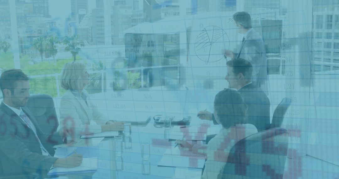 Business Team Viewing Data Trends in Modern Office