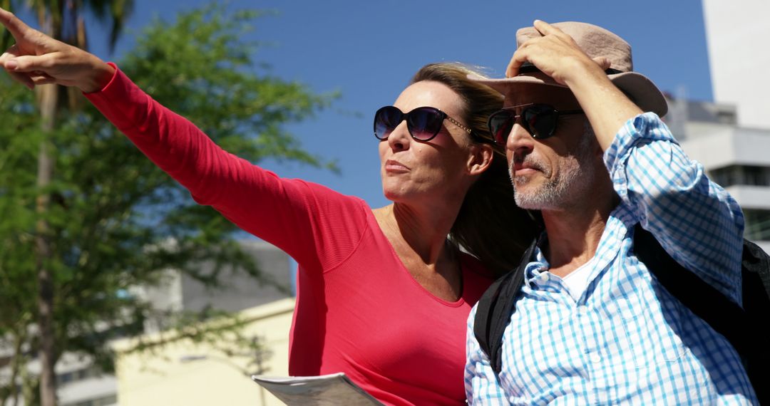 Mature Couple Navigating with Map on Sunny Day