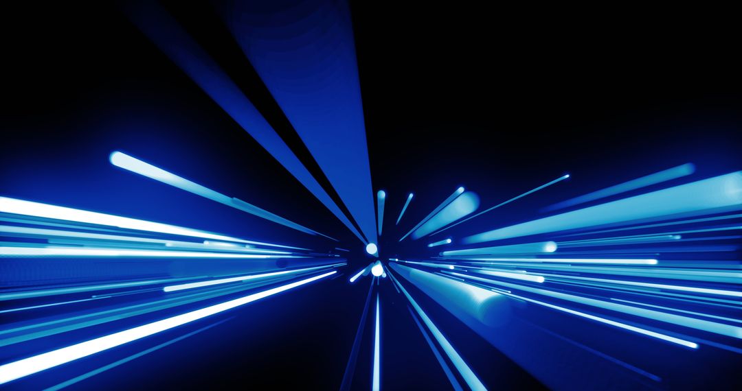 Dynamic Blue Light Trails on Dark Background