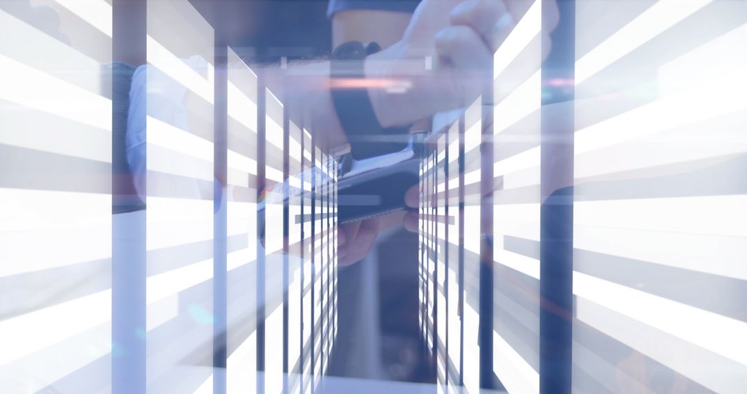 Person Prodding Tech Device in Futuristic LED Environment