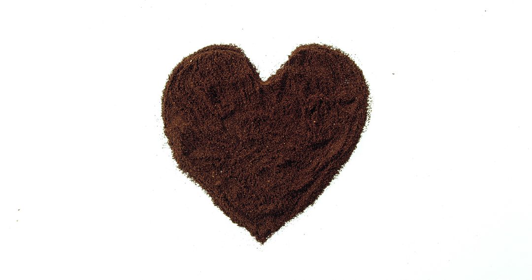 A heart shape is created from coffee grounds against a white background, with copy space - Free Images, Stock Photos and Pictures on Pikwizard.com