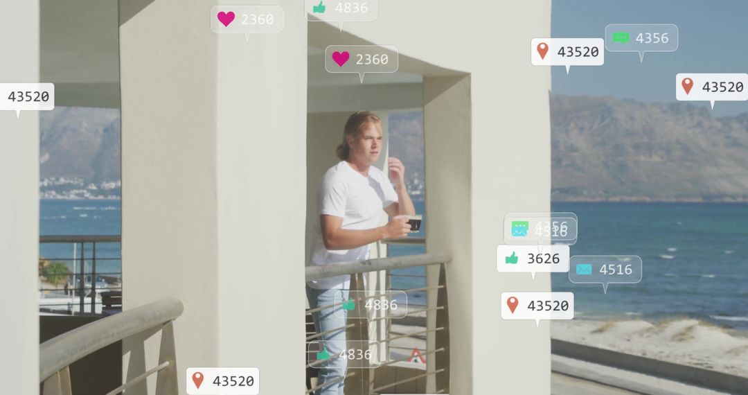 Man Engaging with Social Media Icons by Seaside