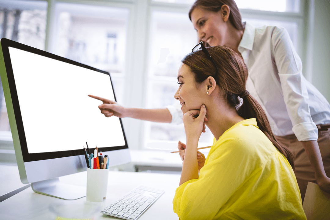 Women Analyzing Data on Computer with Black Transparent Screen