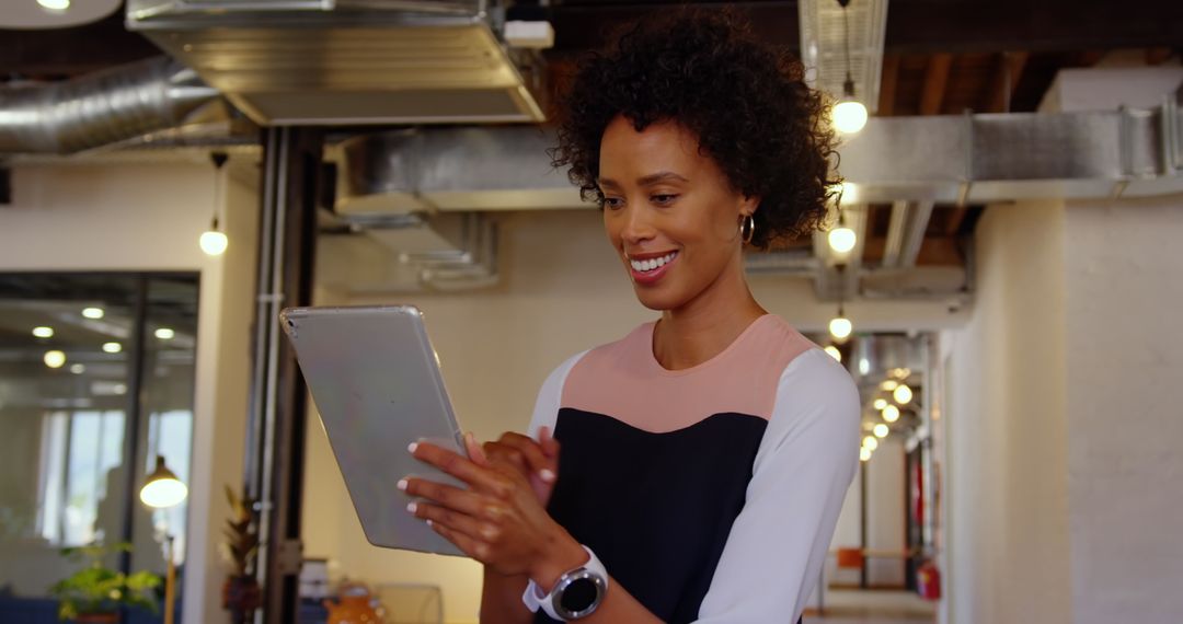 Confident Businesswoman Using Digital Tablet in Modern Office Space
