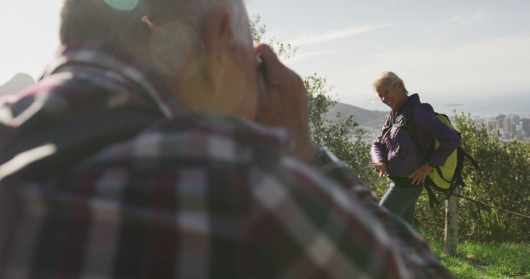 Senior Couple Enjoying Nature Photography on Scenic Hike - Free Images, Stock Photos and Pictures on Pikwizard.com