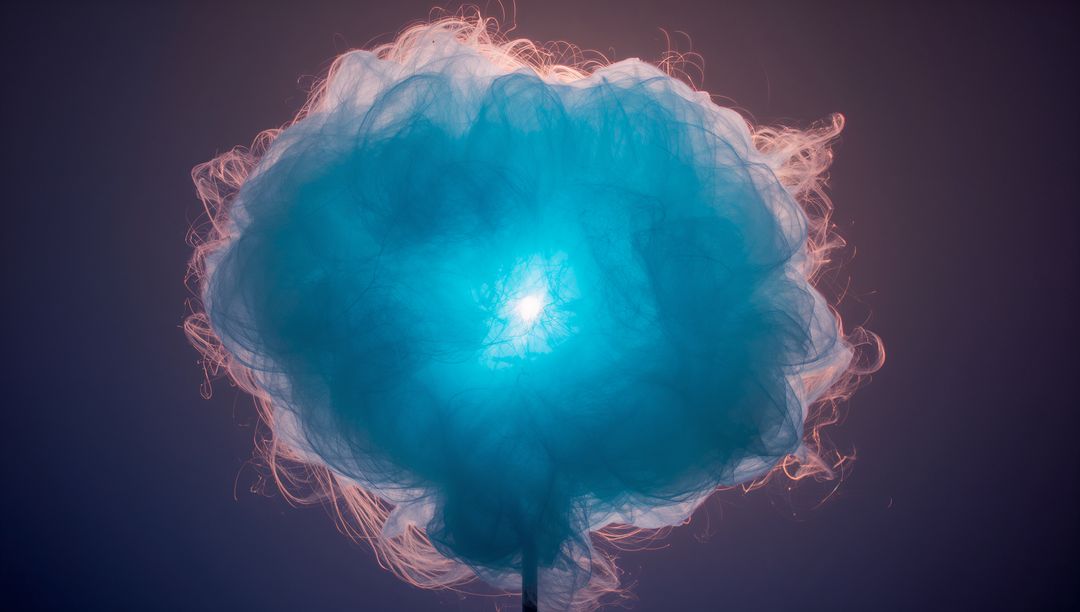 Glowing Blue Cotton Candy Floating on Stick Showing Backlit Halo and Soft Texture