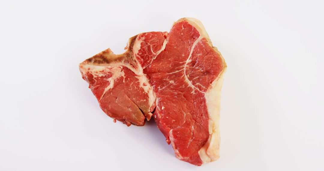 Raw T-bone Steak Meat Against White Background - Free Images, Stock Photos and Pictures on Pikwizard.com