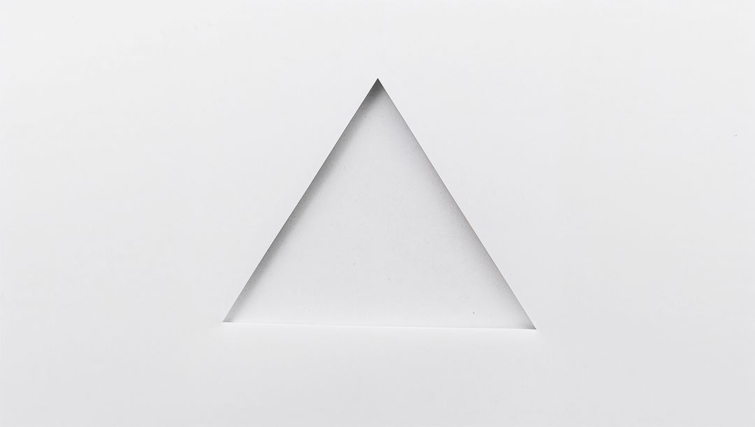 White Paper Triangle Cutout Creating Minimalist Geometric Negative Space Beveled Edges