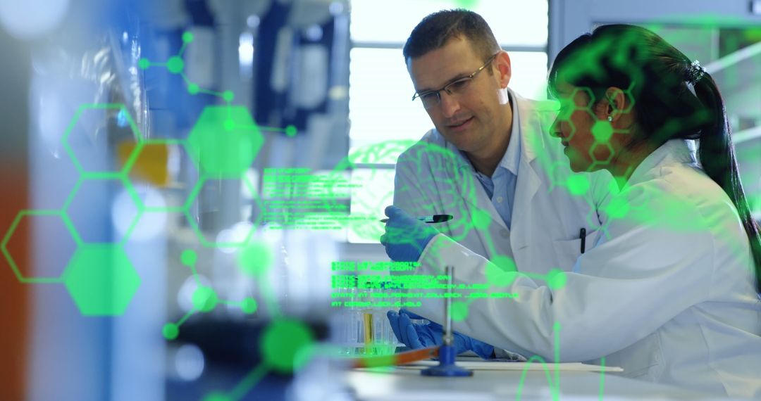 Scientists Collaborating on Medical Data Processing in Laboratory