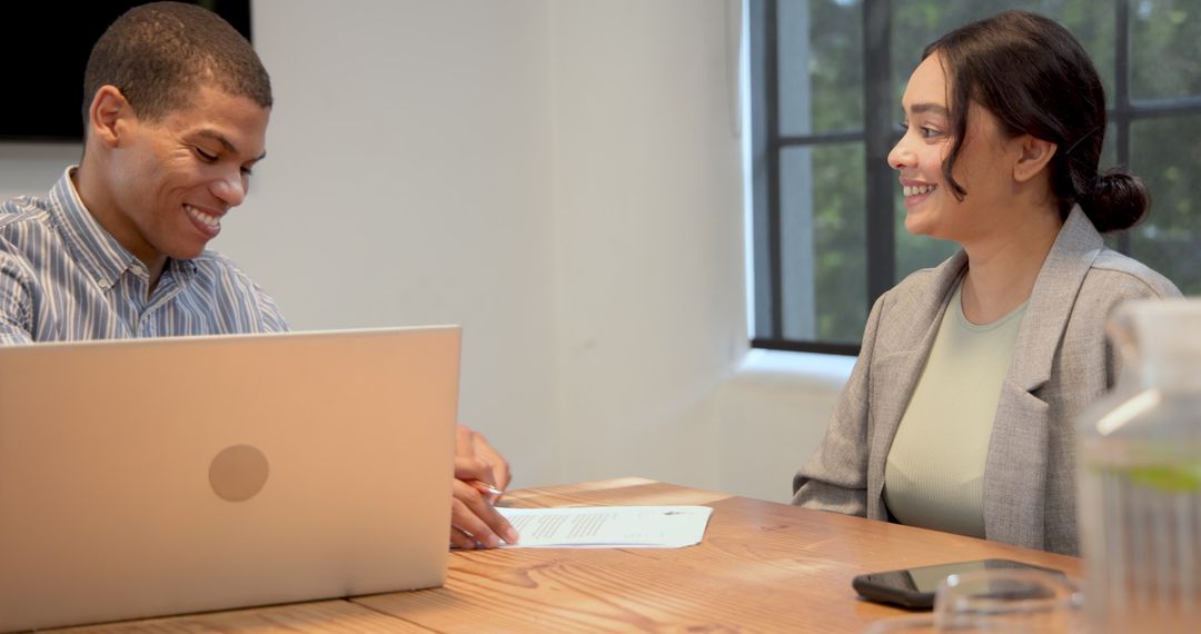 Multiracial Colleagues Engaged in Business Discussion and Collaboration