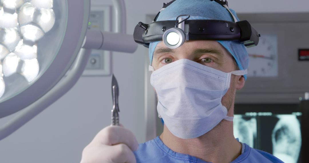 Surgeon Preparing for Surgery in Operating Room with Surgical Tools - Free Images, Stock Photos and Pictures on Pikwizard.com