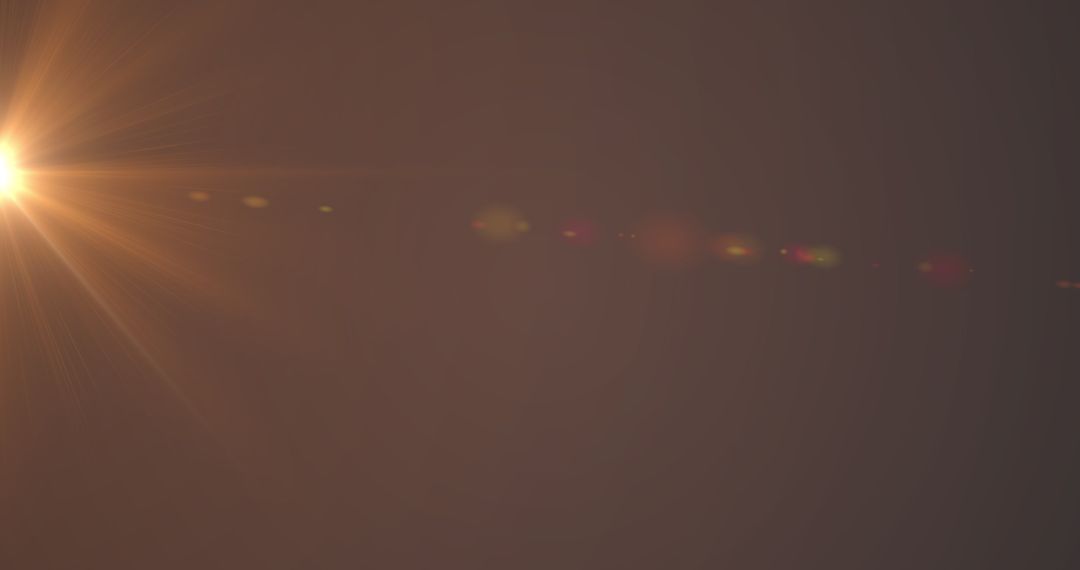 Abstract Glowing Light Flare on Orange Background