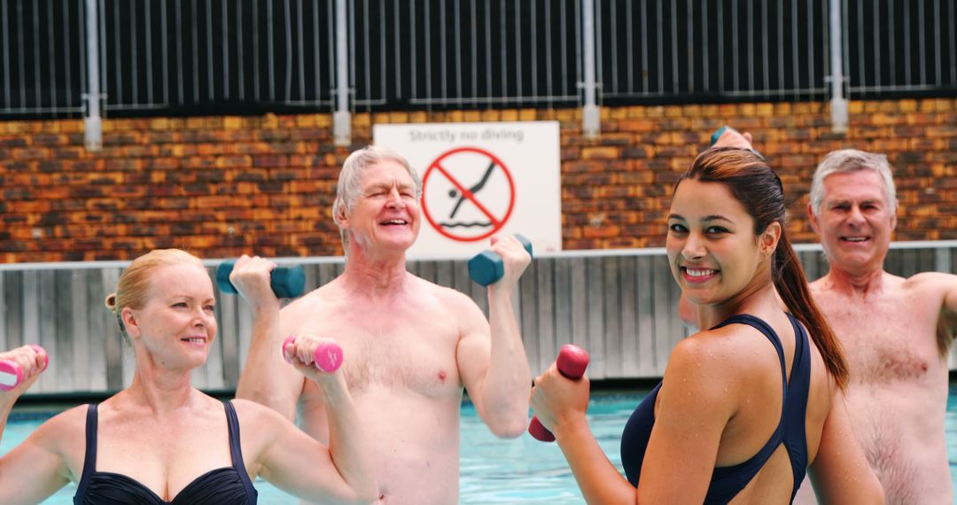 Seniors Participating in Water Aerobics with Instructor in Pool - Free Images, Stock Photos and Pictures on Pikwizard.com