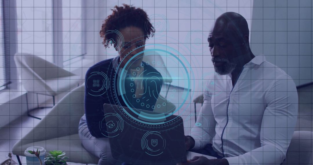 Business Professionals Analyzing Digital Interface on Laptop